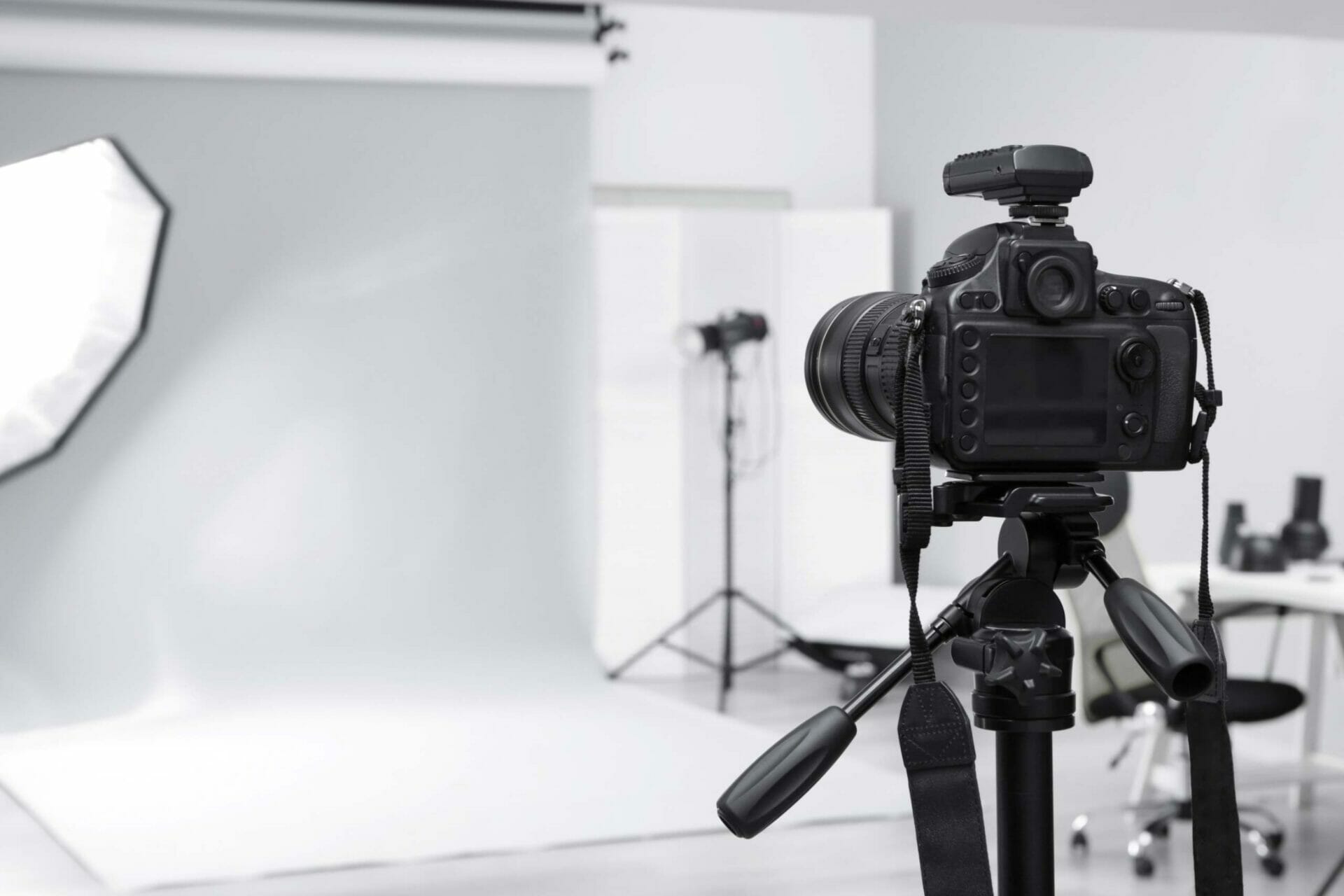 Camera and lights arranged for a product photography set